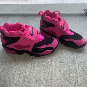 Pink and black Nike Air Diamond Turf